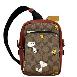 Coach x Peanuts Track Pack 14 In Signature Canvas with Snoopy Woodstock Print